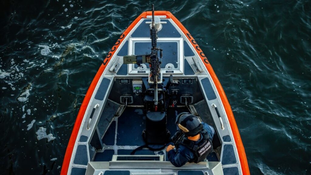 A member of the Coast Guard patrols the waterways near President Donald Trump’s Mar-a-Lago resort in Palm Beach, Fla., Dec. 19, 2024. The Coast Guard is redefining how it views harassment across the service, discarding the concept of “hate incidents” and recasting symbols of hatred, including nooses and swastikas, as potentially “politically divisive.” (Scott McIntyre/The New York Times)