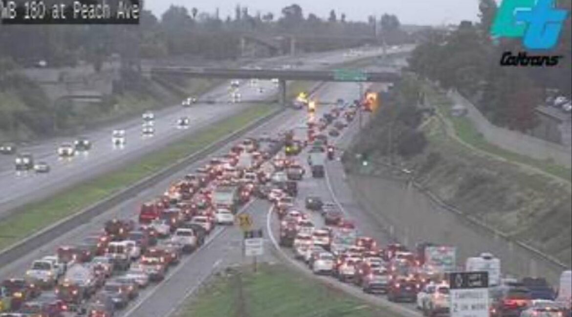 A multi-vehicle collision reduced westbound State Route 180 to one lane near Peach Avenue on Monday, Nov. 17, 2025, morning, backing up traffic for about two miles. (Caltrans)