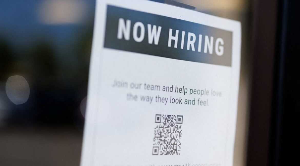 A "now hiring" sign is displayed on a local business after, U.S. employment growth slowed more than expected in July, in Encinitas, California, U.S. August 1, 2025. (Reuters/Mike Blake)
