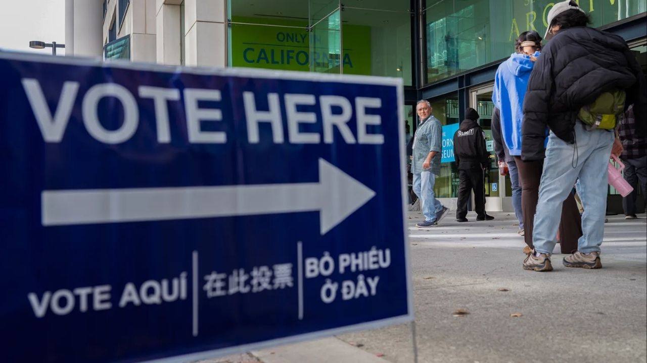 A person exits a vote center the California Museum in Sacramento on Nov. 4, 2025. (CalMatters/Jungho Kim)