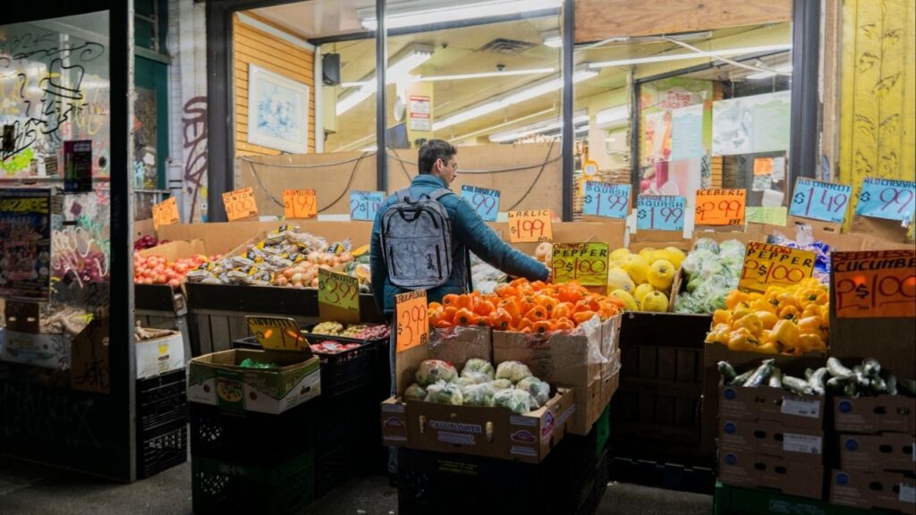 A shopper looks at produce at a grocery in the Bushwick neighborhood of Brooklyn on Wednesday, Nov. 5, 2025. A federal judge ordered the Trump administration on Thursday to fund food stamps in full for roughly 42 million low-income Americans, after admonishing the government for delaying aid under the nation’s largest anti-hunger program during the shutdown.(Hiroko Masuike/The New York Times)