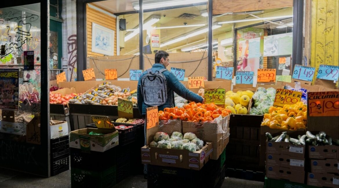A shopper looks at produce at a grocery in the Bushwick neighborhood of Brooklyn on Wednesday, Nov. 5, 2025. A federal judge ordered the Trump administration on Thursday to fund food stamps in full for roughly 42 million low-income Americans, after admonishing the government for delaying aid under the nation’s largest anti-hunger program during the shutdown.(Hiroko Masuike/The New York Times)