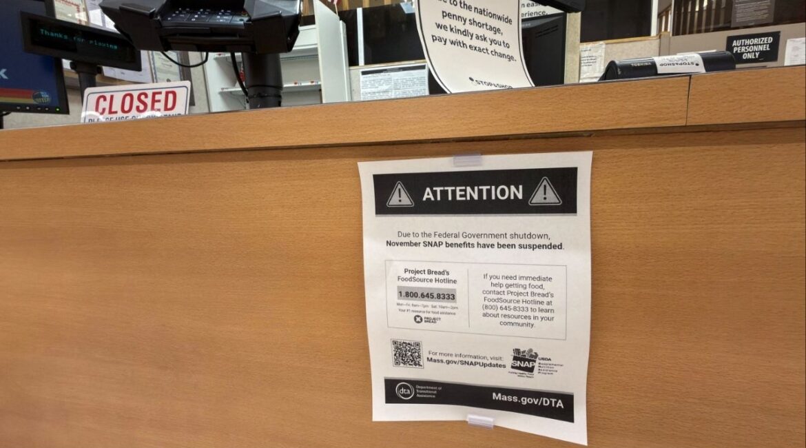 A sign hangs at a customer service area, as the U.S. President Donald Trump administration said it plans on Monday to partially fund food aid for millions of Americans after two judges ruled it must use contingency funds to pay for the benefits in November during the government shutdown, at a grocery story in Long Beach, New York, U.S., November 3, 2025. (Reuters/Shannon Stapleton)