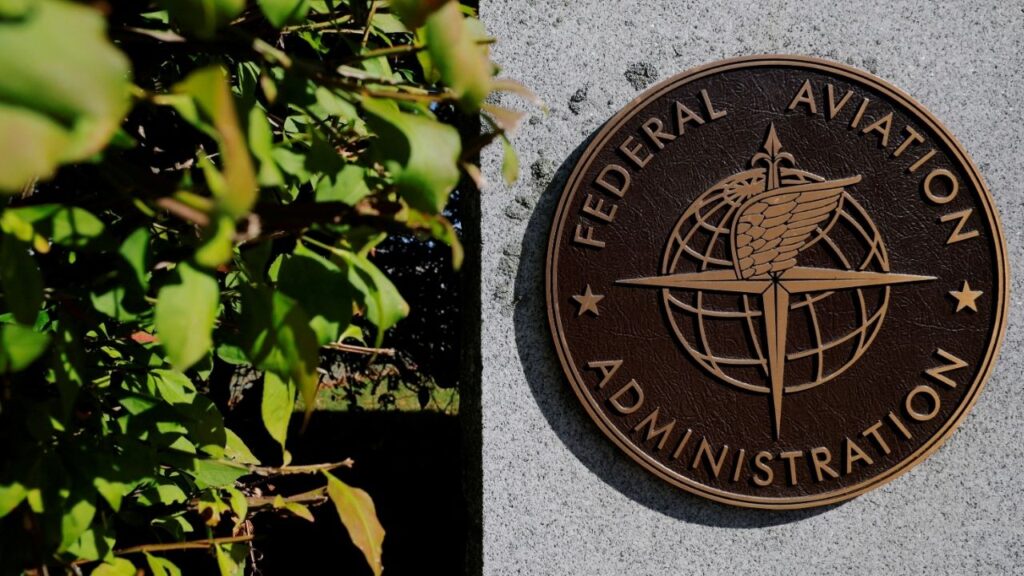 A sign marks the Federal Aviation Administration's (FAA) Boston Air Route Traffic Control Center, where air traffic controllers continue to work during the U.S. government shutdown, in Nashua, New Hampshire, U.S., October 9, 2025. (Reuters/Brian Snyder)