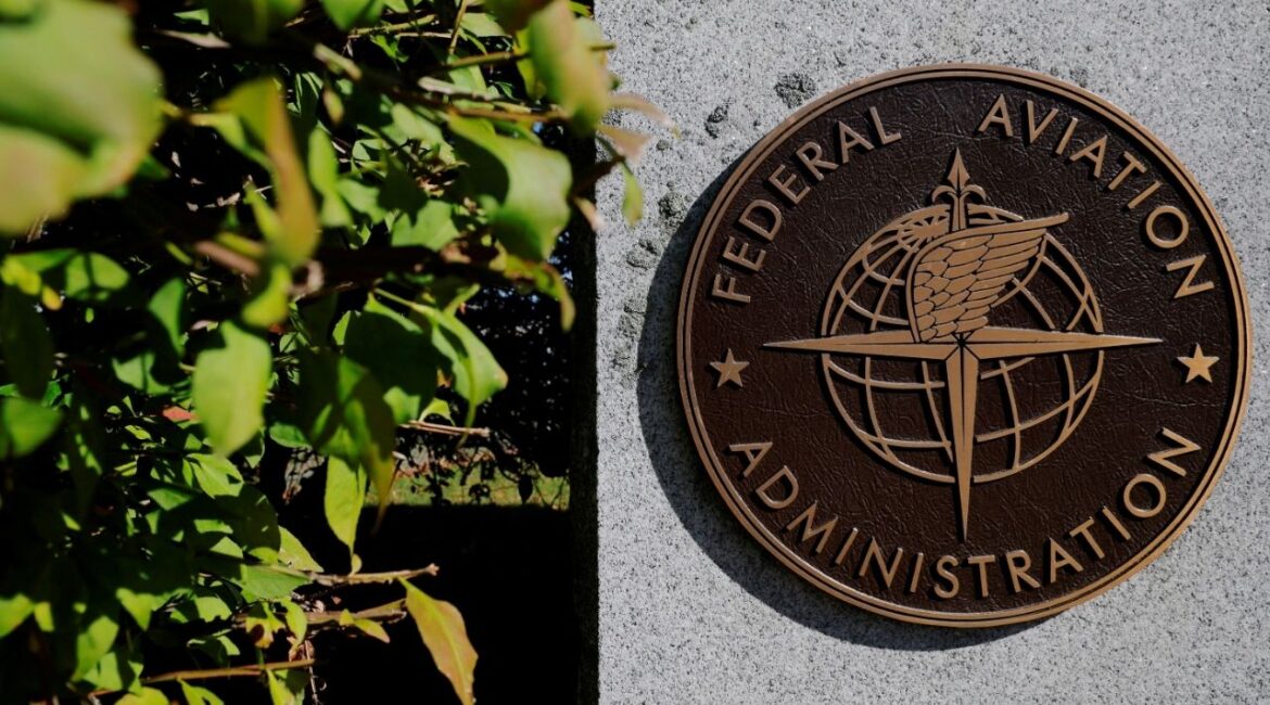 A sign marks the Federal Aviation Administration's (FAA) Boston Air Route Traffic Control Center, where air traffic controllers continue to work during the U.S. government shutdown, in Nashua, New Hampshire, U.S., October 9, 2025. (Reuters/Brian Snyder)