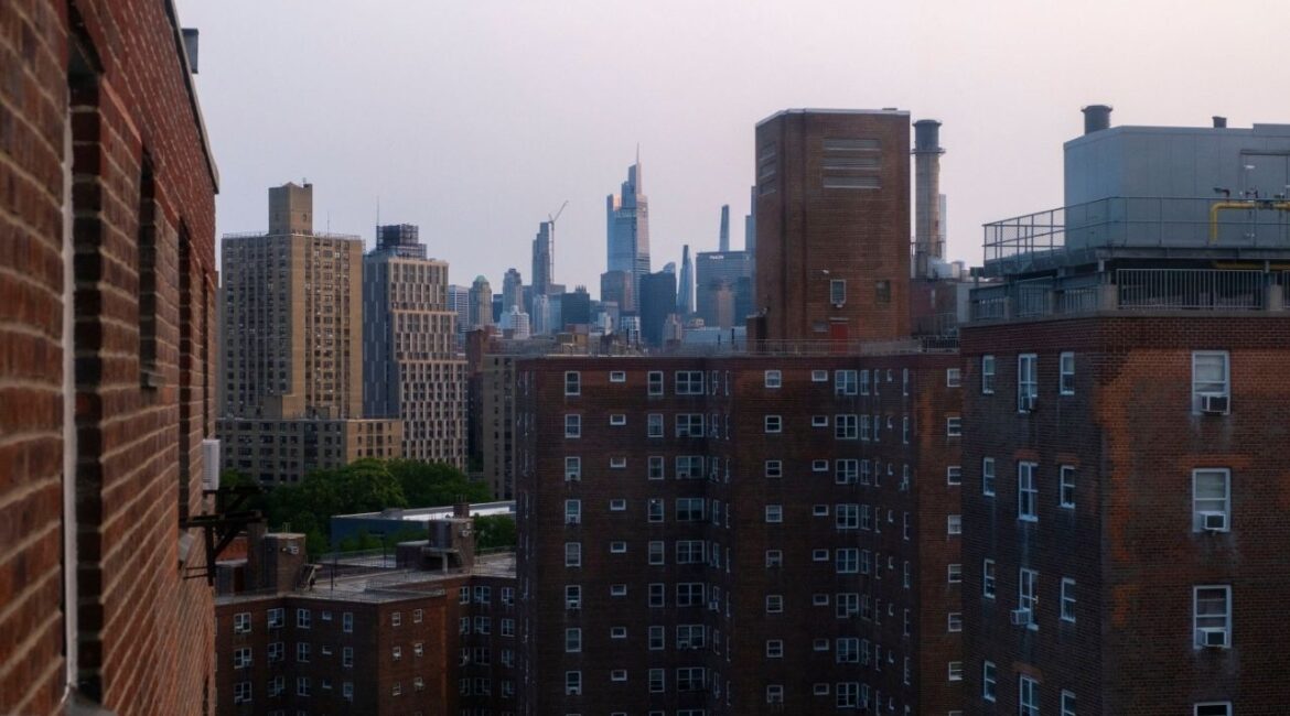 A view of the Manhattan skyline in New York, June 4, 2025. The poor state of many public housing buildings is one of many housing issues beyond freezing the rent that Mayor-elect Zohran Mamdani will be facing as soon as he takes office in January. (Dakota Santiago/The New York Times)