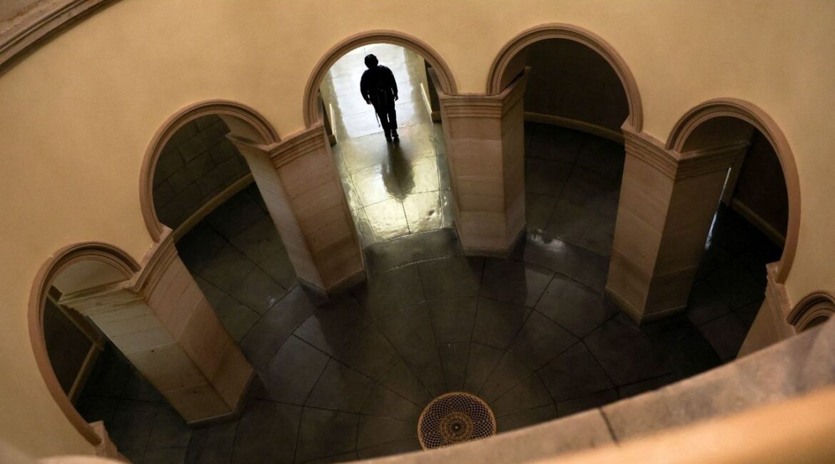 A worker walks through a hallway at the U.S. Capitol in the hours before a partial government shutdown in Washington, D.C., U.S., September 30, 2025. (Reuters File)