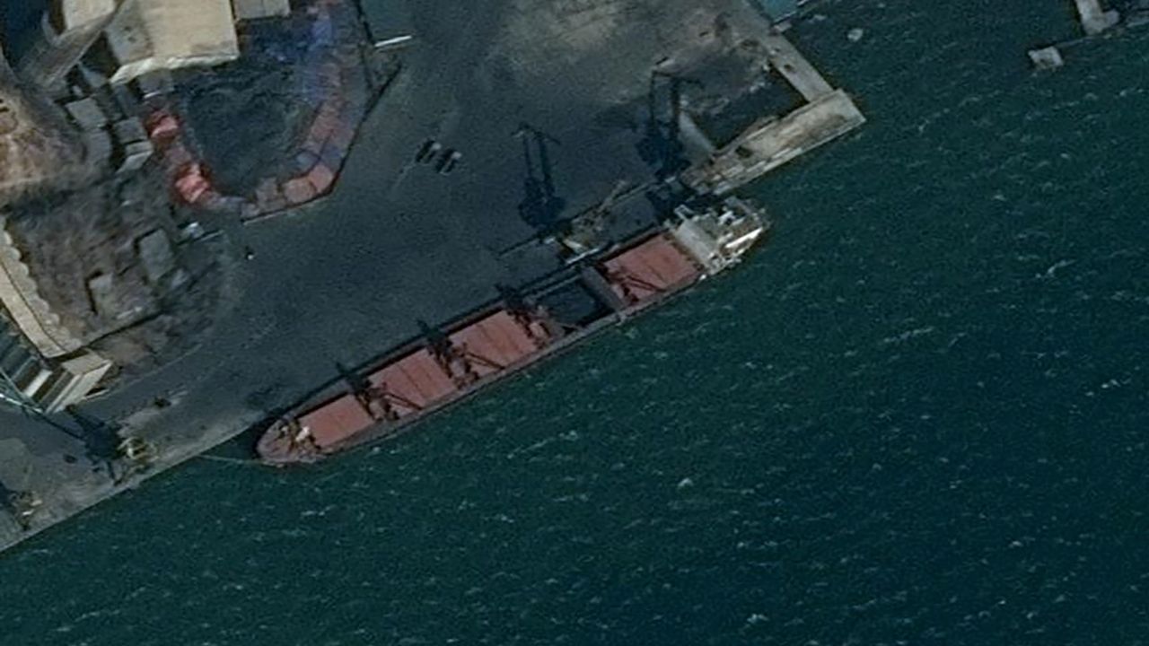 An undated surveillance image provided by the U.S. Department of Justice shows what is described as a North Korean vessel being loaded with coal in Nampo, North Korea. (Reuters File)