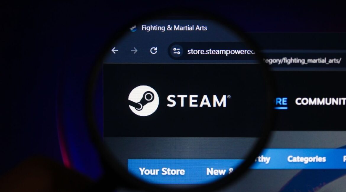 Asset id: 2631578251 Steam website on the Screen enlarged with a magnifying glass. Indonesia - May 22, 2025 See less