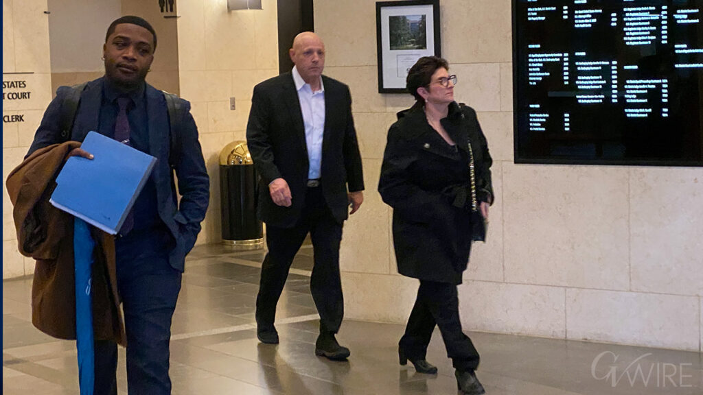 Attorney Serguel Akiti walks out of court with Bobby Salazar, and Salazar‘s wife Lucy Ruiz.