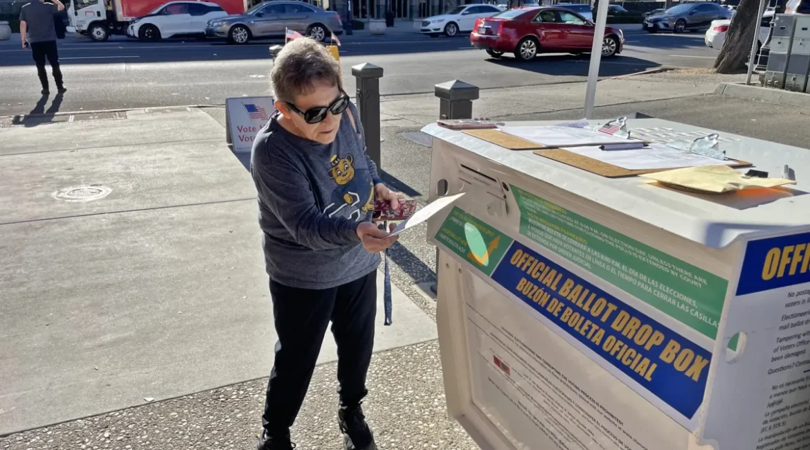 Image of a Turlock, California, resident voting in downtown Modesto