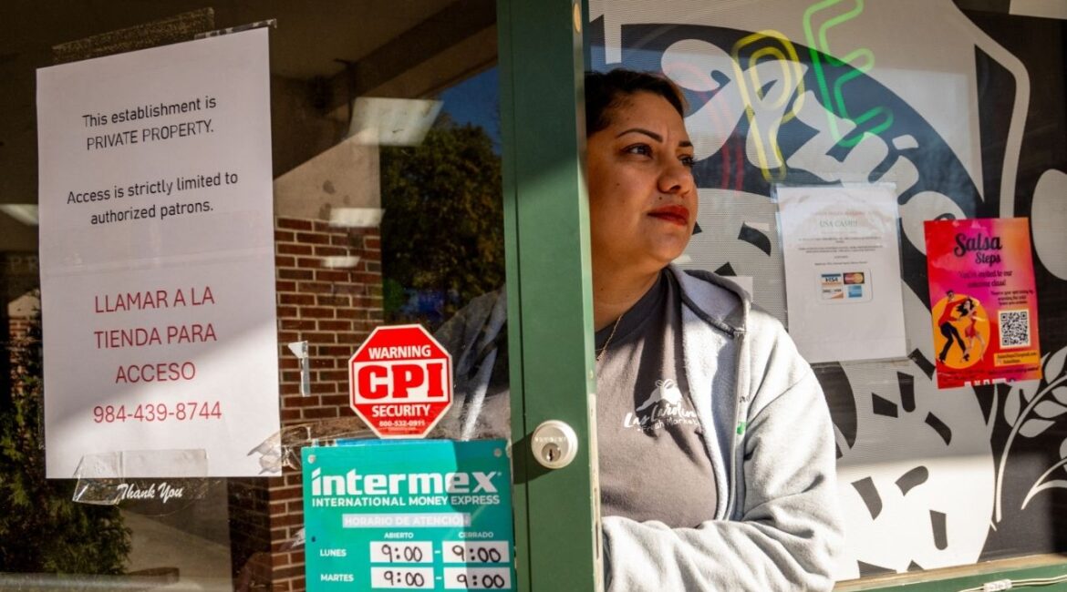 Claudia Martin, the owner of Las Carolinas Fresh Market, who said that her business would stay open, but with restricted entrance, in Durham, N.C. on Nov. 18, 2025. Agents were active in the Raleigh area on Tuesday, on Nov. 18, though the scope of the immigration crackdown in the state’s Research Triangle region was not immediately clear. (Kate Medley/The New York Times)