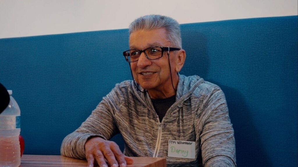 Danny Borrero sits down with GV Wire before his shift at First Fruits Market on Friday, Nov. 7, 2025. (GV Wire)