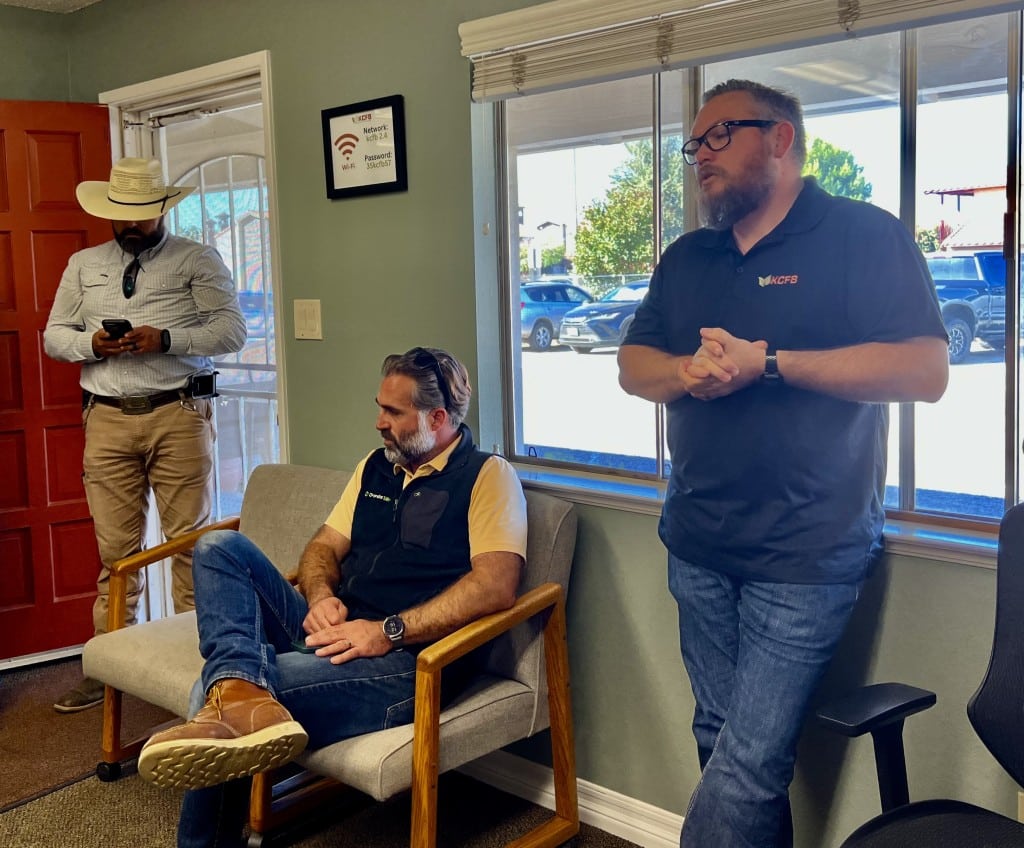 Image of Kings County Farm Bureau Executive Director Dusty Ference talking to growers