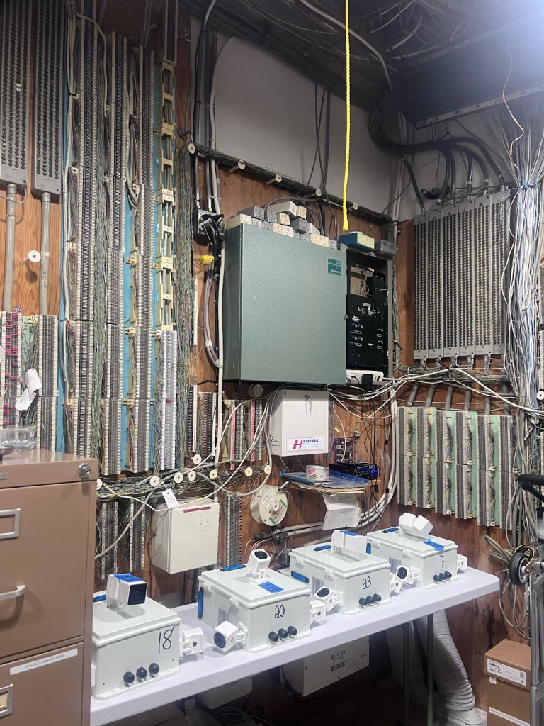Image of a closet containing the electricity equipment to power the Merced Police station
