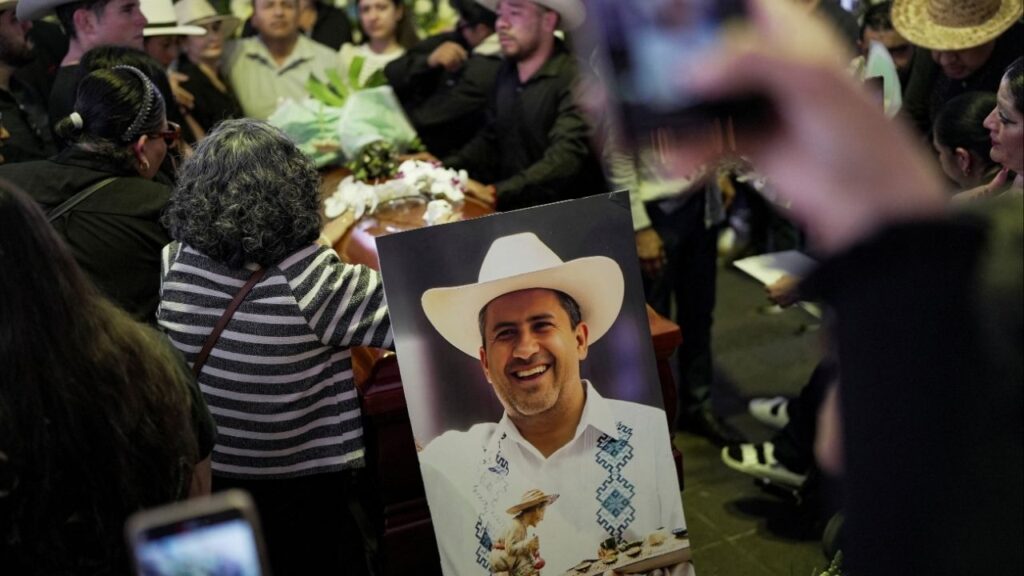 Family and friends attend the funeral of Carlos Manzo, the mayor who was shot dead during a Day of the Dead event, in Uruapan, Mexico, November 2, 2025. (Reuters/Ivan Arias)