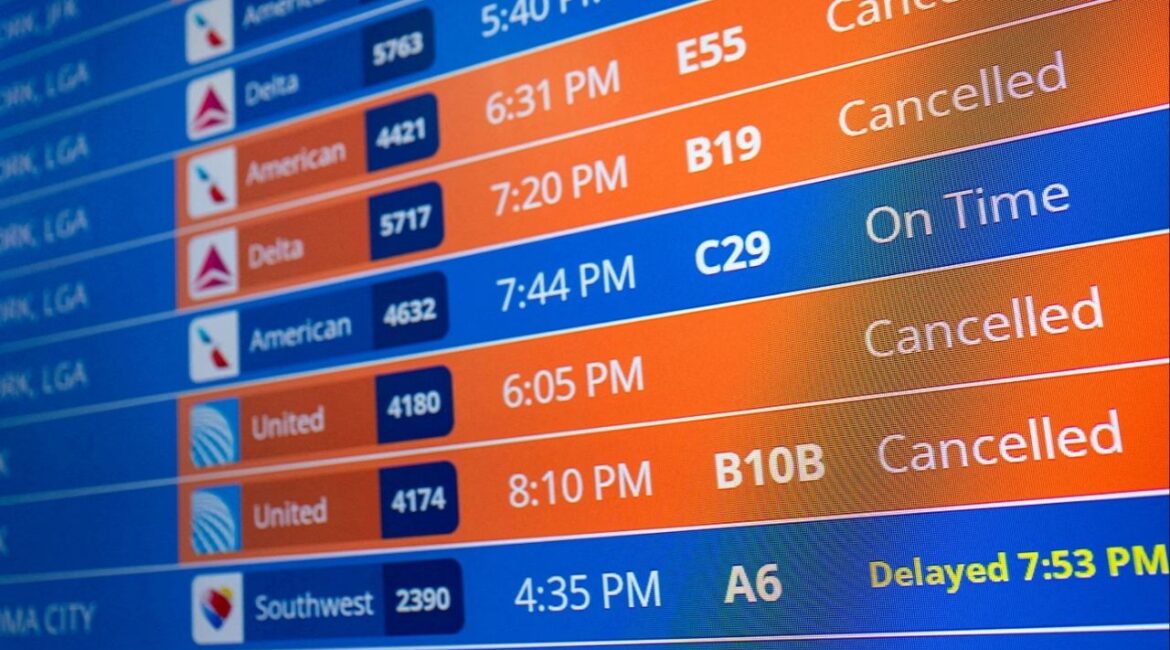 Flight timings and cancellations are displayed on the departures board, a month into the ongoing U.S. government shutdown, at Ronald Reagan Washington National Airport in Arlington, Virginia, U.S., November 9, 2025. (Reuters/Annabelle Gordon)