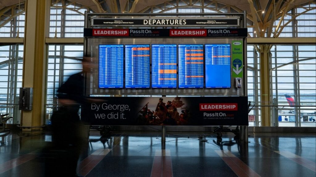 Flight timings and cancellations are displayed on the departures board at Ronald Reagan Washington National Airport, more than a month into the ongoing U.S. government shutdown, in Arlington, Virginia, U.S., November 9, 2025. (Reuters/Annabelle Gordon)