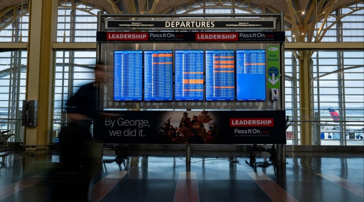 Flight timings and cancellations are displayed on the departures board at Ronald Reagan Washington National Airport, more than a month into the ongoing U.S. government shutdown, in Arlington, Virginia, U.S., November 9, 2025. (Reuters/Annabelle Gordon)