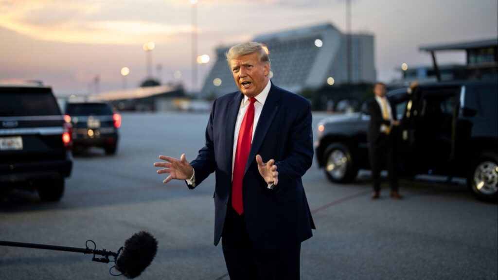 Former President Donald Trump speaks to reporters at the airport in Atlanta after his booking at the Fulton County Jail in Georgia, Aug. 24, 2023. Georgia’s criminal election interference case against Trump and a number of his allies entered a new phase on Nov. 14, 2025, as the executive director of the state’s prosecutor council appointed himself to take over the case, replacing Fani T. Willis, who is now disqualified from pursuing it. (Doug Mills/The New York Times)