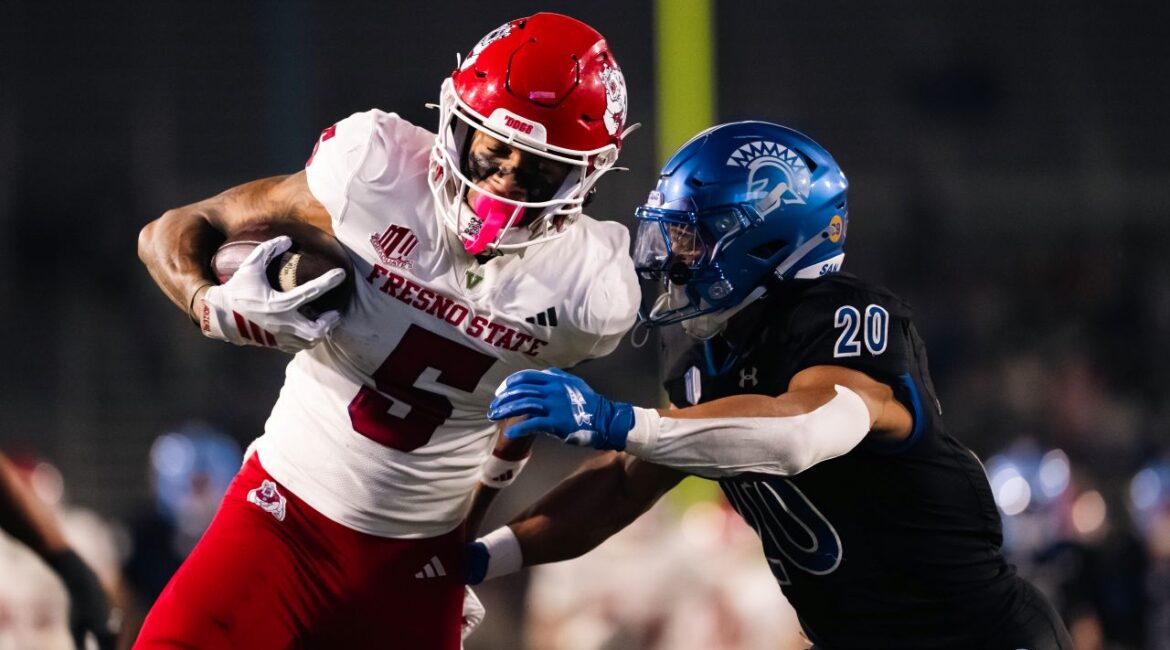 Image Of Fresno State wide receiver Josiah Freeman running with the football for a touchdown