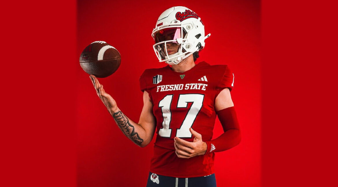 Image of Fresno State QB Carson Conklin spinning football on his fingertip