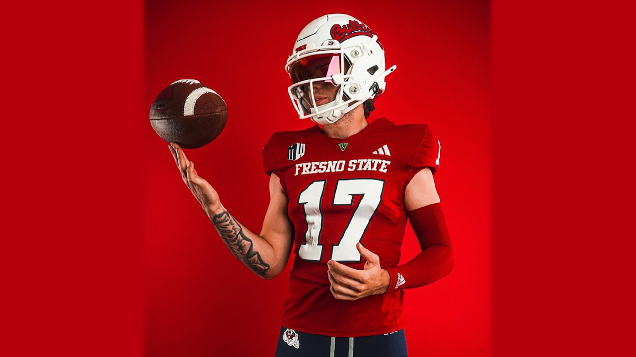 Image of Fresno State QB Carson Conklin spinning football on his fingertip