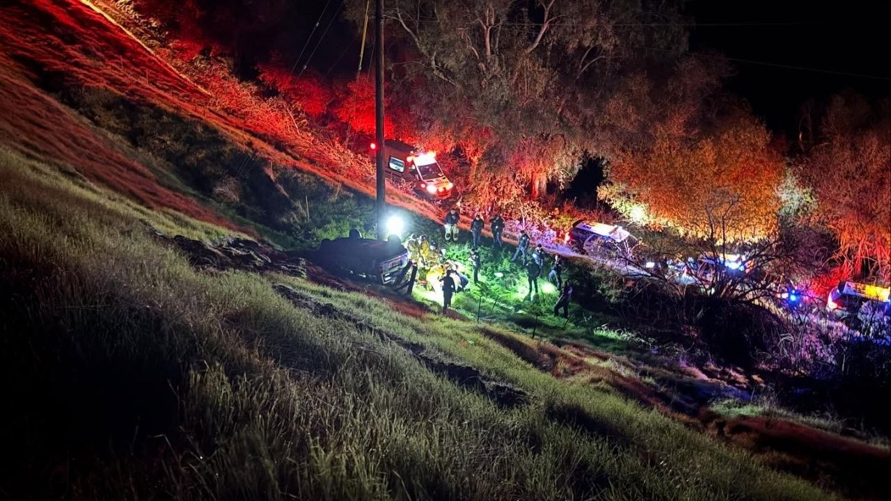 Fresno firefighters used the Jaws of Life to rescue a driver trapped in a Jeep that rolled down an embankment and struck a power pole Sunday, Nov. 16, 2025, evening, and the driver was hospitalized with moderate injuries. (Fresno FD)