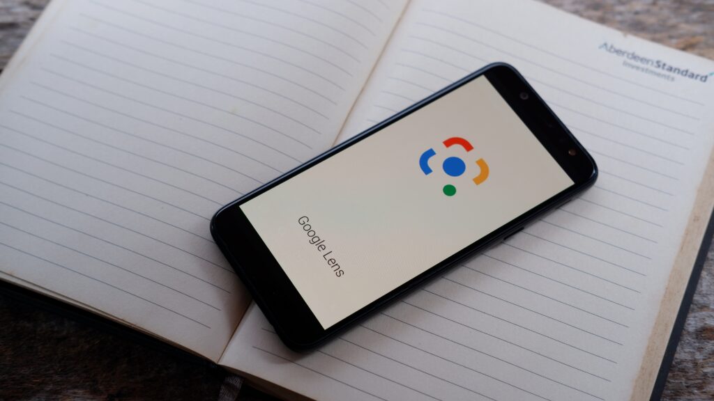 Image of Google Lens app and an open notebook