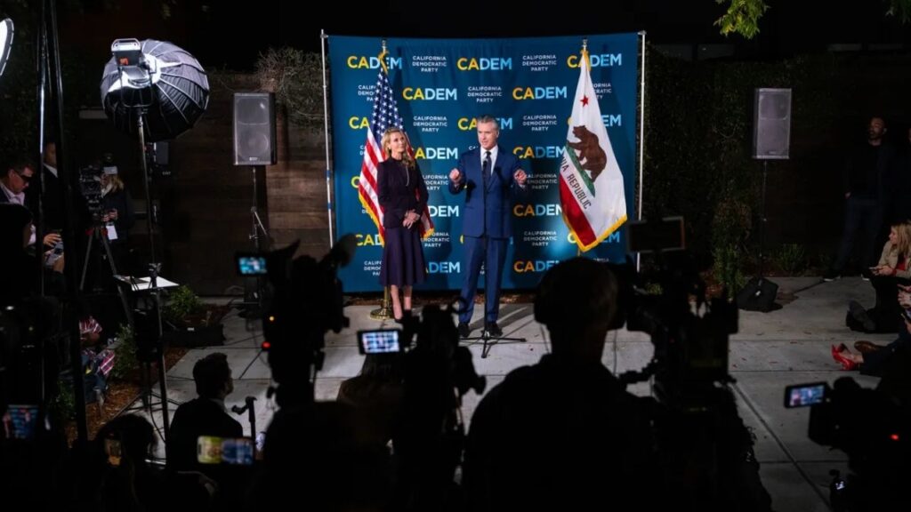 Gov. Gavin Newsom speaks to the press, alongside First Partner Jennifer Siebel Newsom, after Proposition 50 was passed by California voters, at the California Democratic Party headquarters in Sacramento on Nov. 4, 2025. (CalMatters/Jungho Kim)