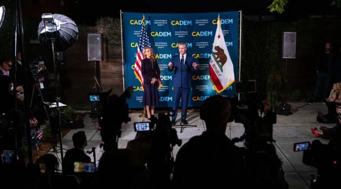 Gov. Gavin Newsom speaks to the press, alongside First Partner Jennifer Siebel Newsom, after Proposition 50 was passed by California voters, at the California Democratic Party headquarters in Sacramento on Nov. 4, 2025. (CalMatters/Jungho Kim)
