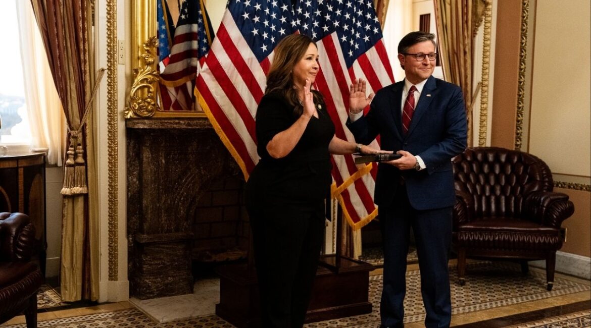 House Speaker Mike Johnson (R-La.) left, swears in Rep. Adelita Grijalva, (D-Ariz.), at the U.S. Capitol on Wednesday, Nov. 12, 2025. (Haiyun Jiang/The New York Times)