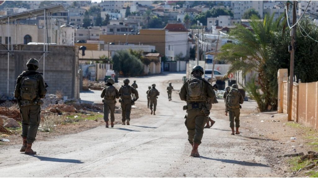 Israeli soldiers walk during an operation in Tubas, in the Israeli-occupied West Bank, November 26, 2025. (Reuters/Mohamad Torokman)