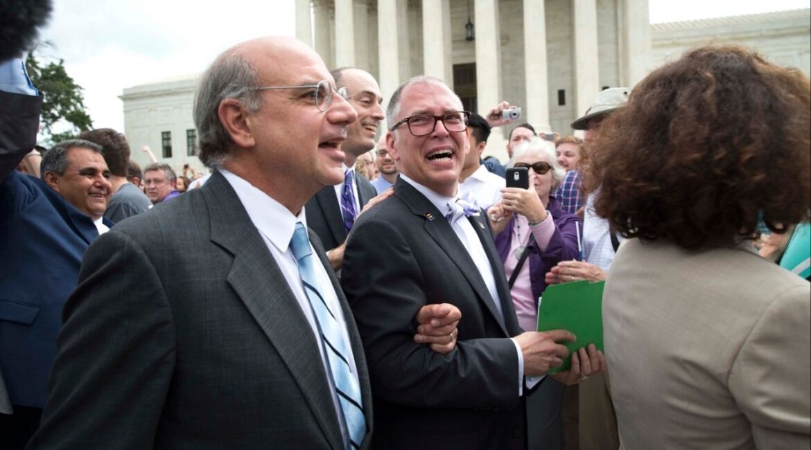 James Obergefell, center, the plaintiff in the same-sex marriage case Obergefell v. Hodges that resulted in a constitutional right to same-sex marriage, leaves the Supreme Court after the ruling in Washington, June 26, 2015. In November 2025, the court is considering whether to hear a case that would ask them to overturn Obergefell. (Doug Mills/The New York Times)