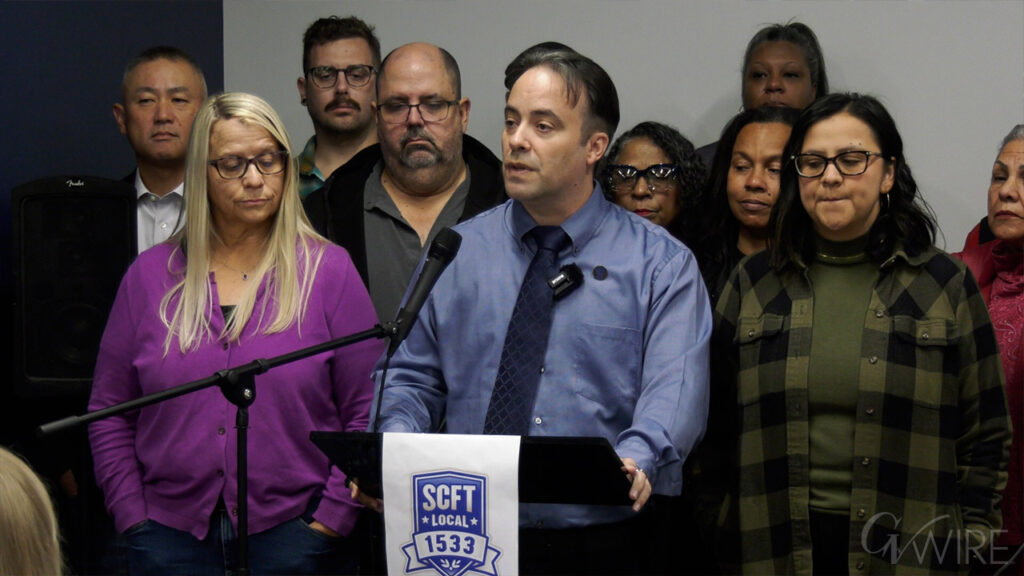 Keith Ford, president of the State Center Federation of Teachers, announces on Nov. 17, 2025 the union's unanimous decision to hold a vote of "no confidence of chancellor Carole Goldsmith.