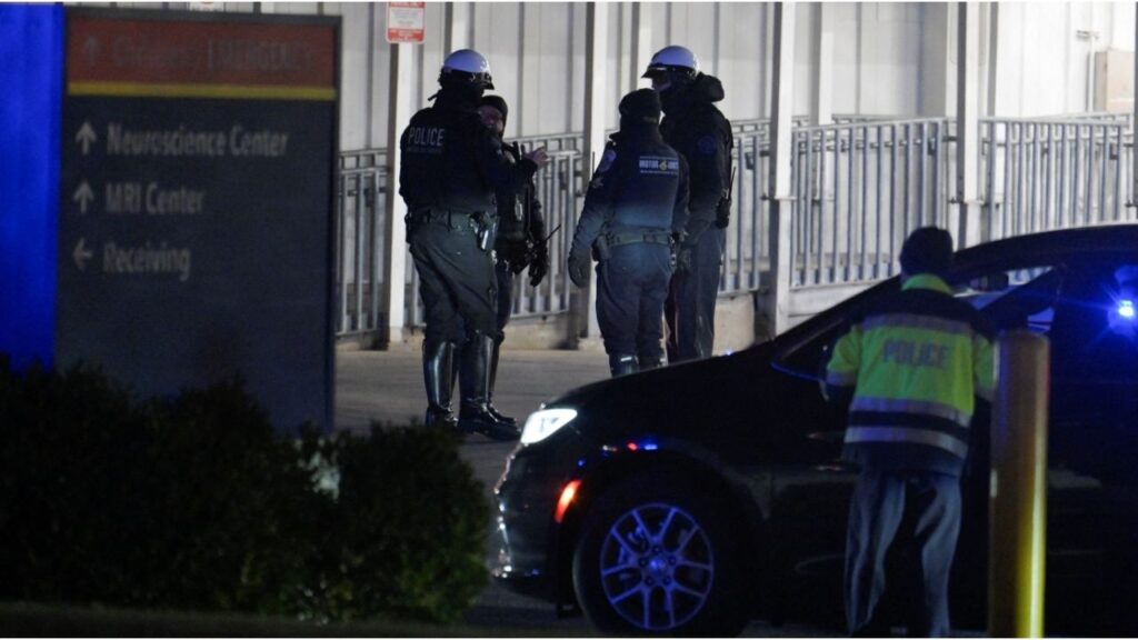 Law enforcement officers gather on the day the body of slain West Virginia National Guard member Sarah Beckstrom is transferred from Medstar Washington Hospital Center, a day after she was shot in Washington, D.C., U.S., November 27, 2025. (Reuters/Craig Hudson)