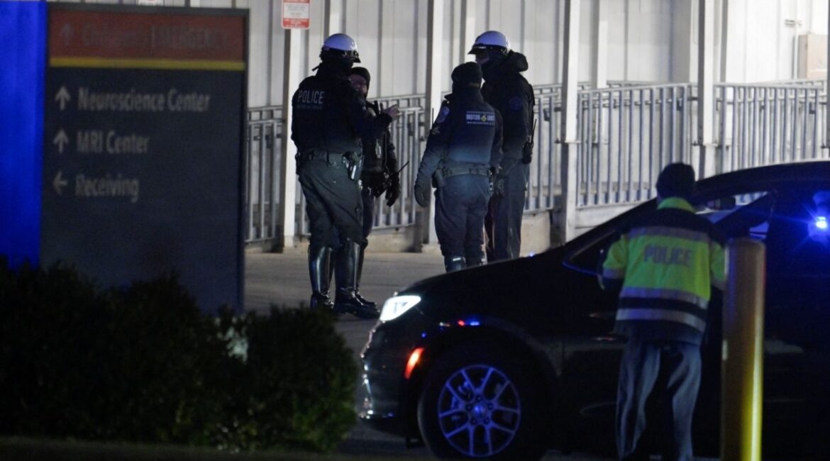 Law enforcement officers gather on the day the body of slain West Virginia National Guard member Sarah Beckstrom is transferred from Medstar Washington Hospital Center, a day after she was shot in Washington, D.C., U.S., November 27, 2025. (Reuters/Craig Hudson)