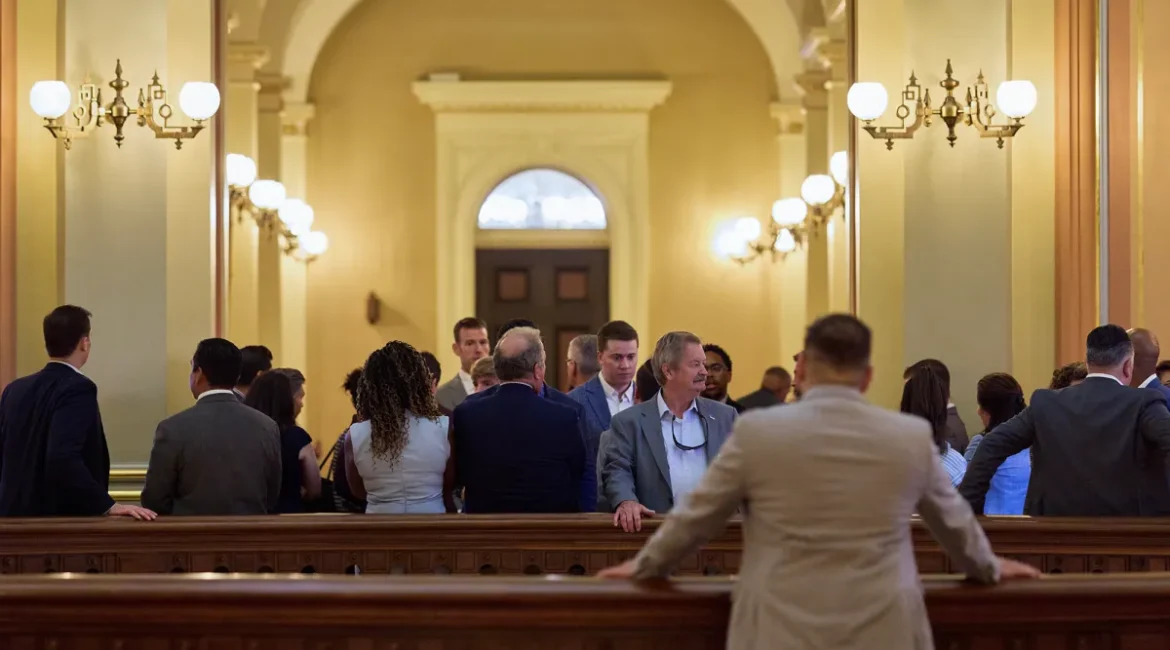 Image of lobbyists and other visitors gathering in the rotunda of the California state Capitol