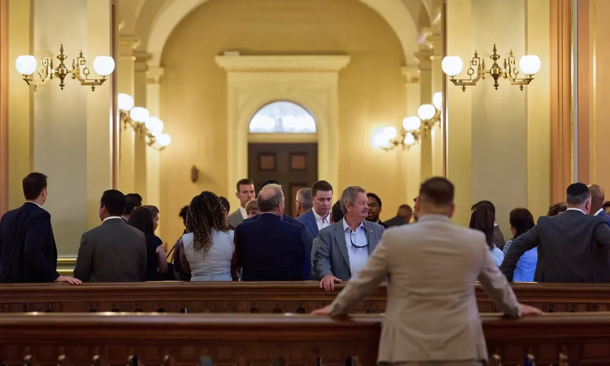 Image of lobbyists and other visitors gathering in the rotunda of the California state Capitol