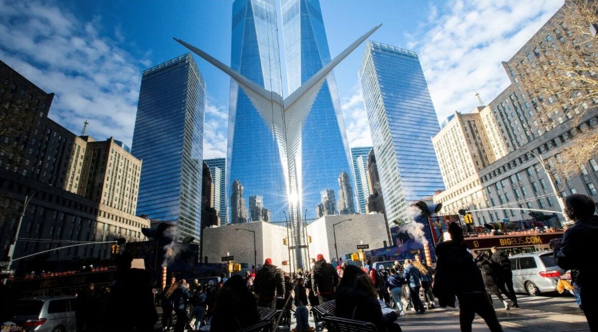 People walk around the Financial District near the New York Stock Exchange (NYSE) in New York, U.S., December 29, 2023. (Reuters/Eduardo Munoz)