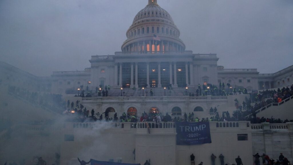 Police officers stand guard as supporters of U.S. President Donald Trump gather in front of the U.S. Capitol Building in Washington, U.S., January 6, 2021. (Reuters/Leah Millis)