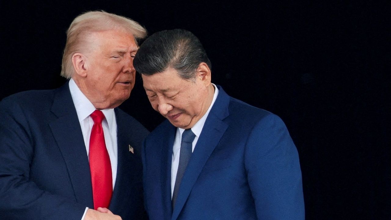 President Donald Trump and Chinese President Xi Jinping talk as they leave after a bilateral meeting at Gimhae International Airport, on the sidelines of the Asia-Pacific Economic Cooperation (APEC) summit, in Busan, South Korea, October 30, 2025. (Reuters File)