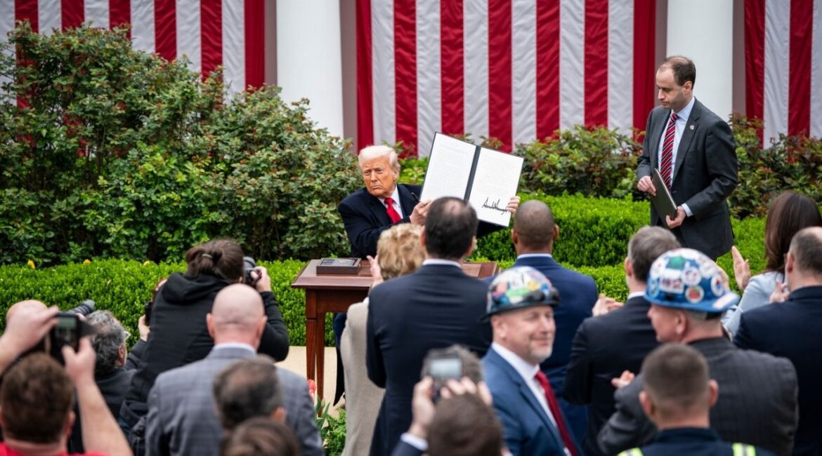 President Donald Trump holds up a signed executive order during a news conference announcing tariffs at the White House in Washington, April 2, 2025. The Supreme Court is set to consider the legality of tariffs the president has invoked emergency powers to place on many trading partners. (Haiyun Jiang/The New York Times)