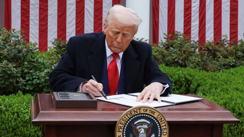 President Donald Trump signs an executive order on tariffs, in the Rose Garden at the White House in Washington, D.C., U.S., April 2, 2025. (Reuters File)