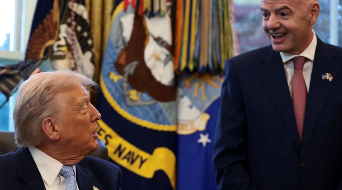President Donald Trump sits next to FIFA President Gianni Infantino, as he meets with the White House Task Force on the FIFA World Cup 2026 in the Oval Office at the White House in Washington, D.C., U.S., November 17, 2025. (Reuters/Evelyn Hockstein)
