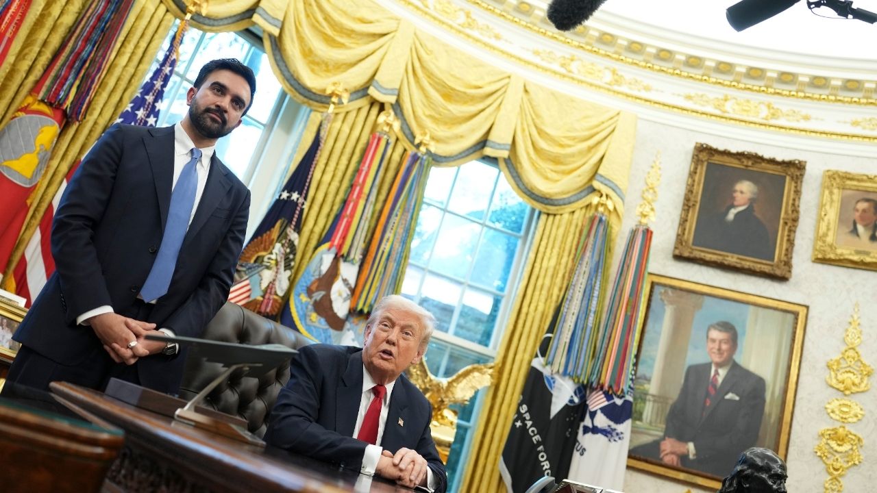 President Donald Trump speaks as New York Mayor-elect Zohran Mamdani stands beside him in the Oval Office of the White House in Washington, on Friday, Nov. 21, 2025. (Eric Lee/The New York Times)