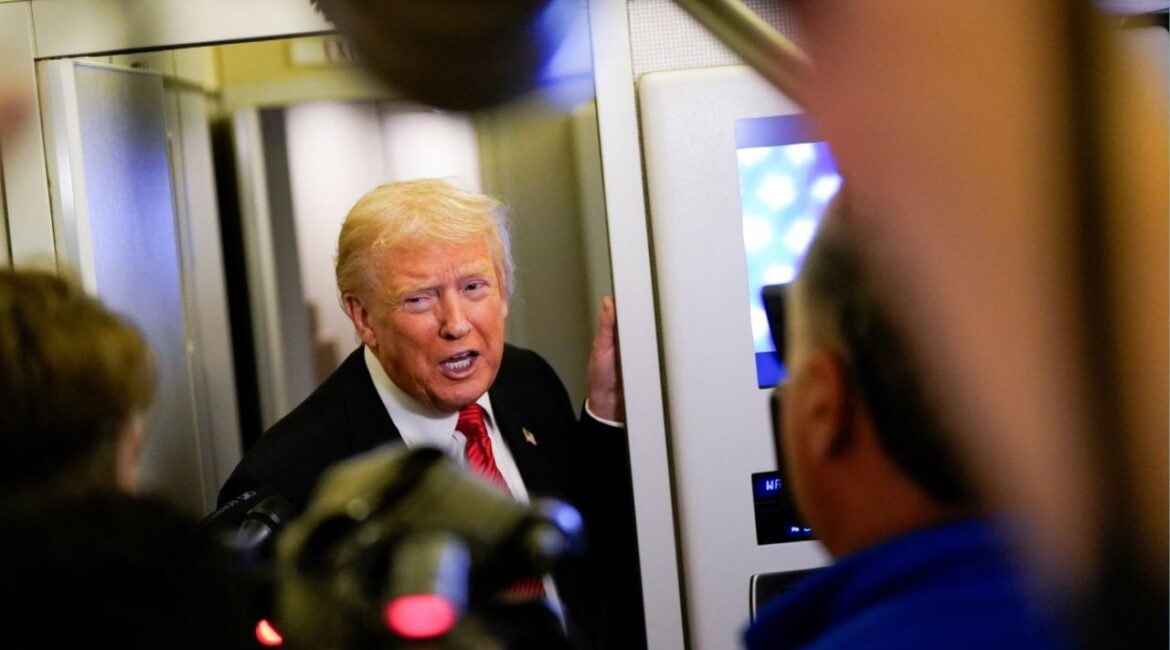 President Donald Trump speaks to members of the media on board Air Force One en route to Joint Base Andrews, U.S., November 2, 2025. (Reuters/Elizabeth Frantz)