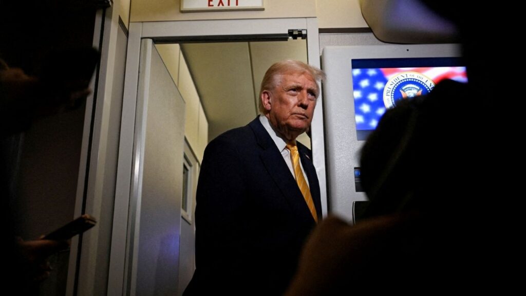 President Donald Trump talks to members of the press on board Air Force One en route to Florida, U.S., November 14, 2025. (Reuters/Annabelle Gordon)