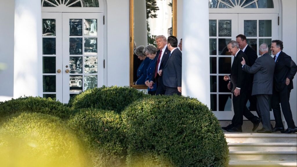 President Donald Trump walks with White House Chief of Staff Susie Wiles as he shows a group of Republican Senators around the Oval Office at the White House in Washington, on Wednesday, Nov. 5, 2025. (Haiyun Jiang/The New York Times)