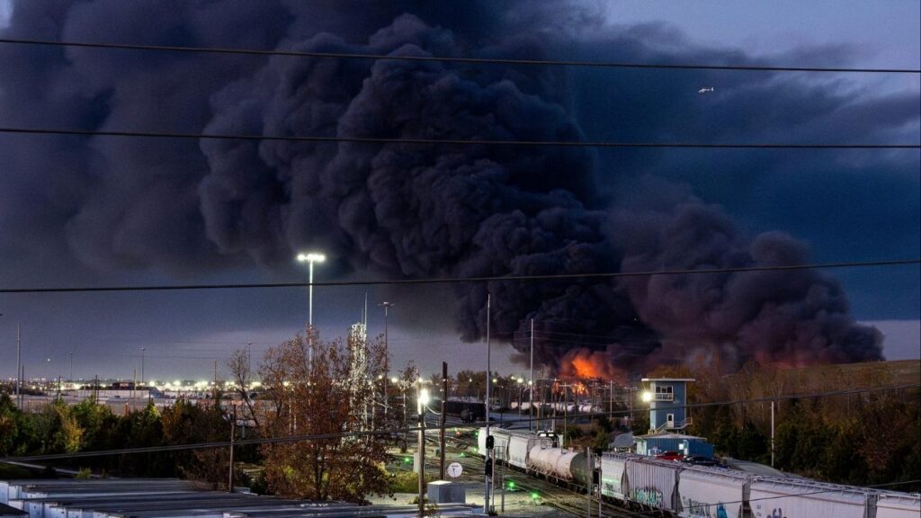Smoke rises from the wreckage of a UPS MD-11 cargo jet after it crashed on departure from Louisville Muhammad Ali International Airport in Louisville, Kentucky, U.S. November 4, 2025. (Jeff Faughender/USA Today Network via Reuters)